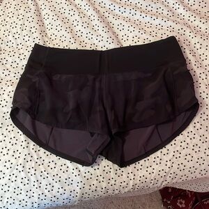 Women’s black high rise lululemon shorts, size small/medium.